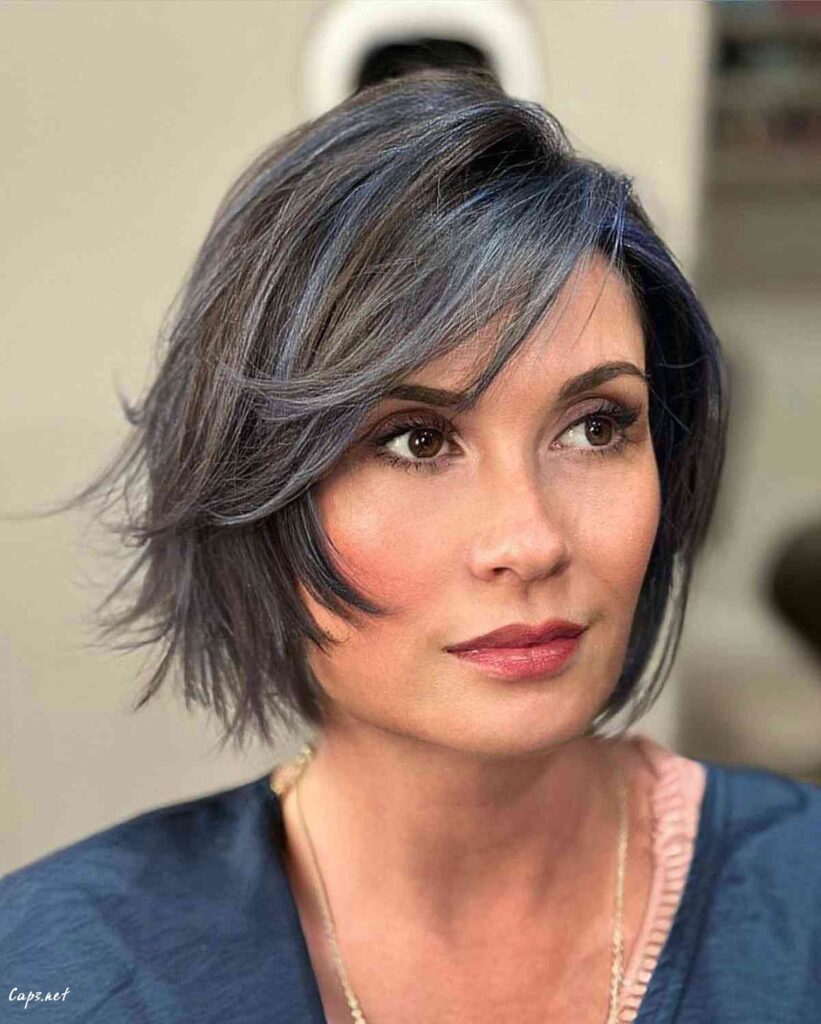 choppy neck length cut with violet highlights