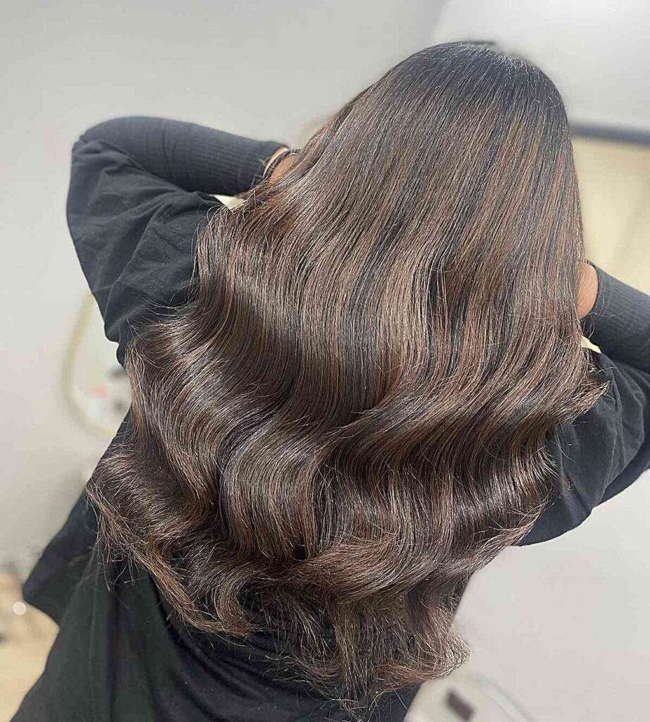 black rooted caramel brown balayage hair with hints of ash
