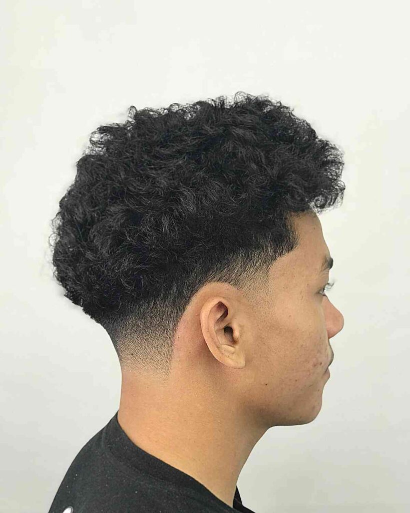 curly french crop with a low fade for men