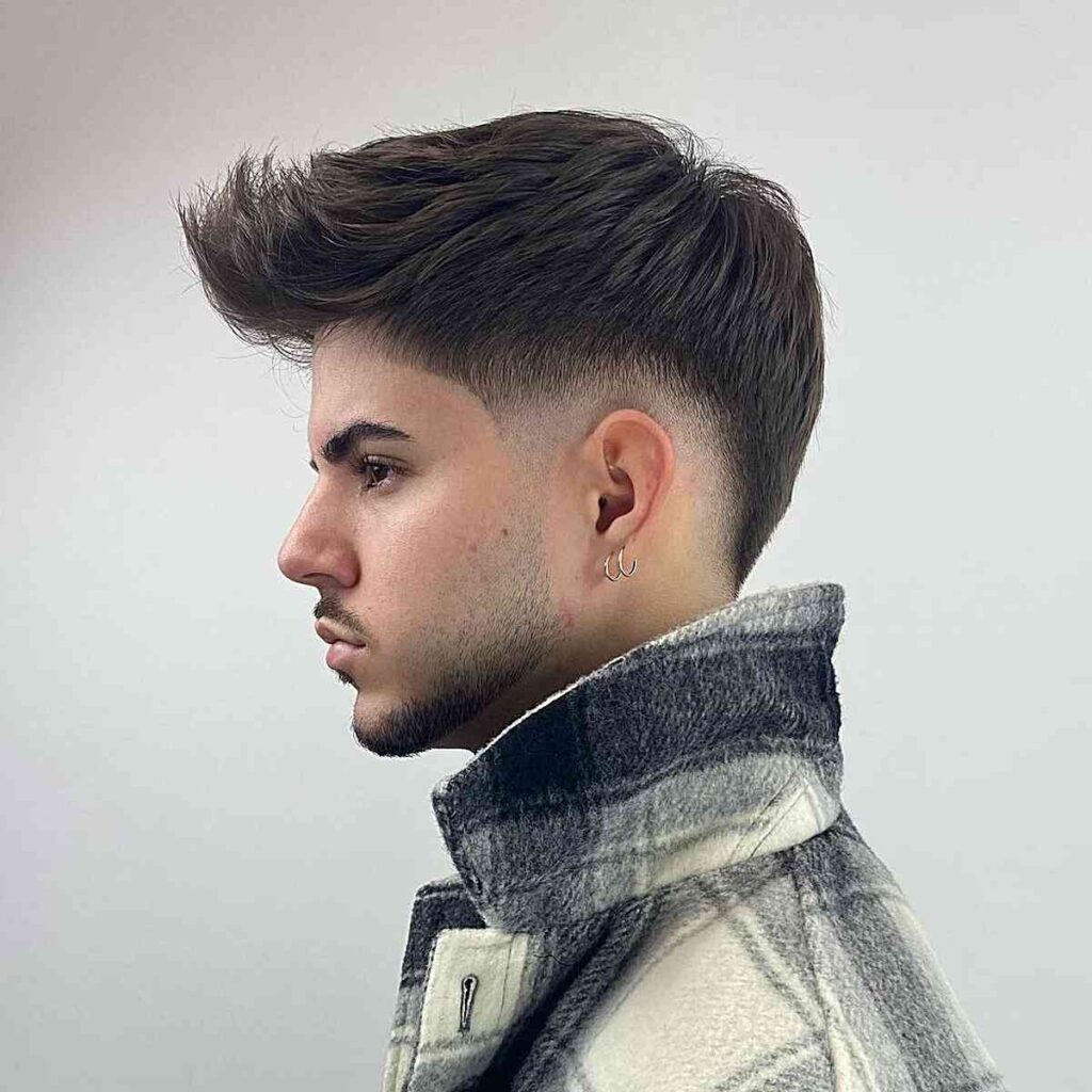low fade brushed up quiff for guys