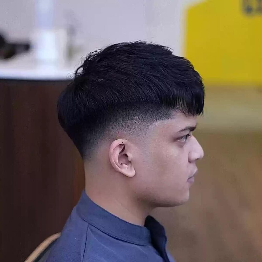 low fade haircut with flat fringe for men