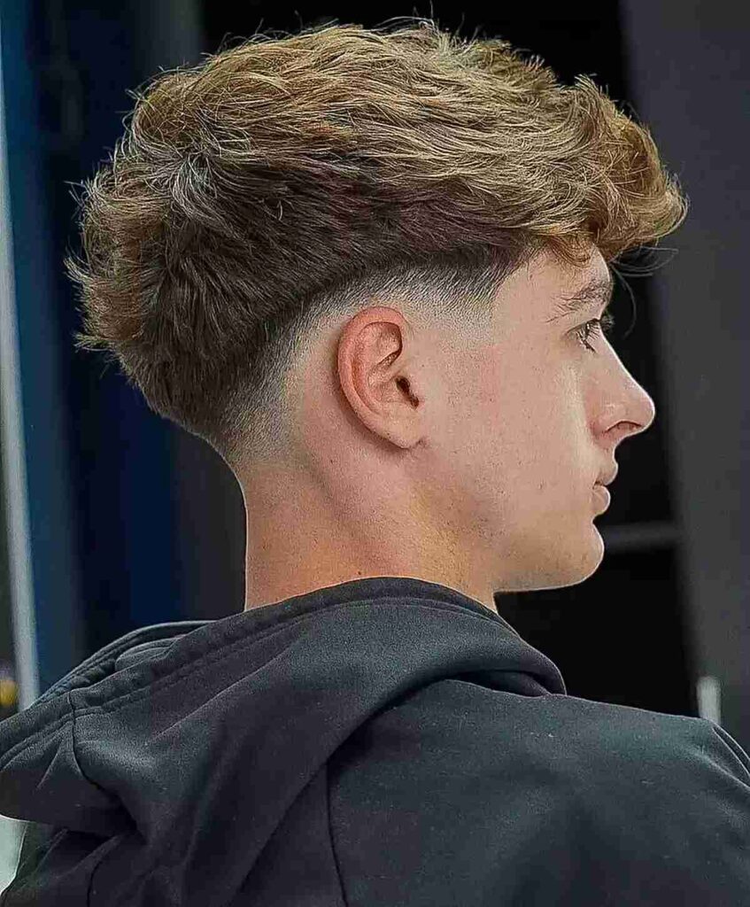 short low faded choppy haircut with fringe for young men