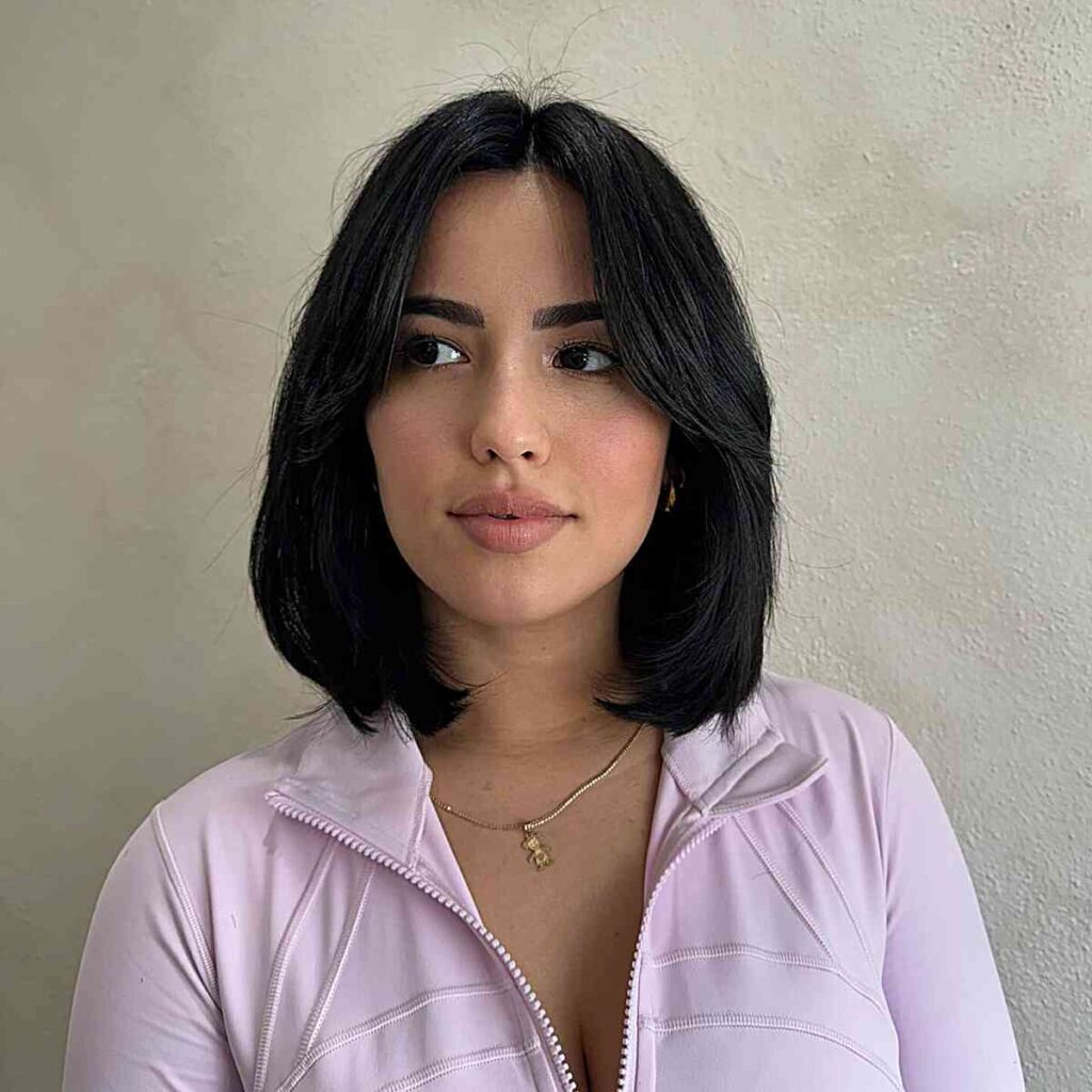 90s longer bob with middle parted bangs