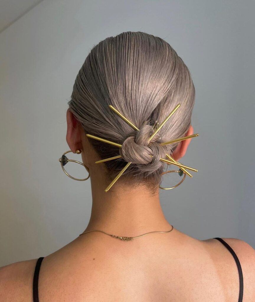 Low Placed Bun With A Hair Clip