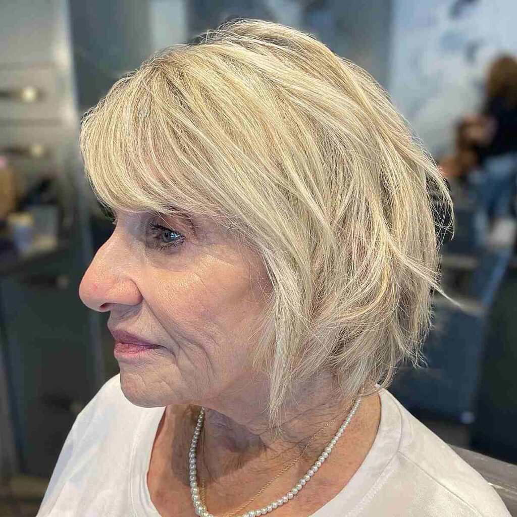blonde pixie bob with thin bangs for an old lady