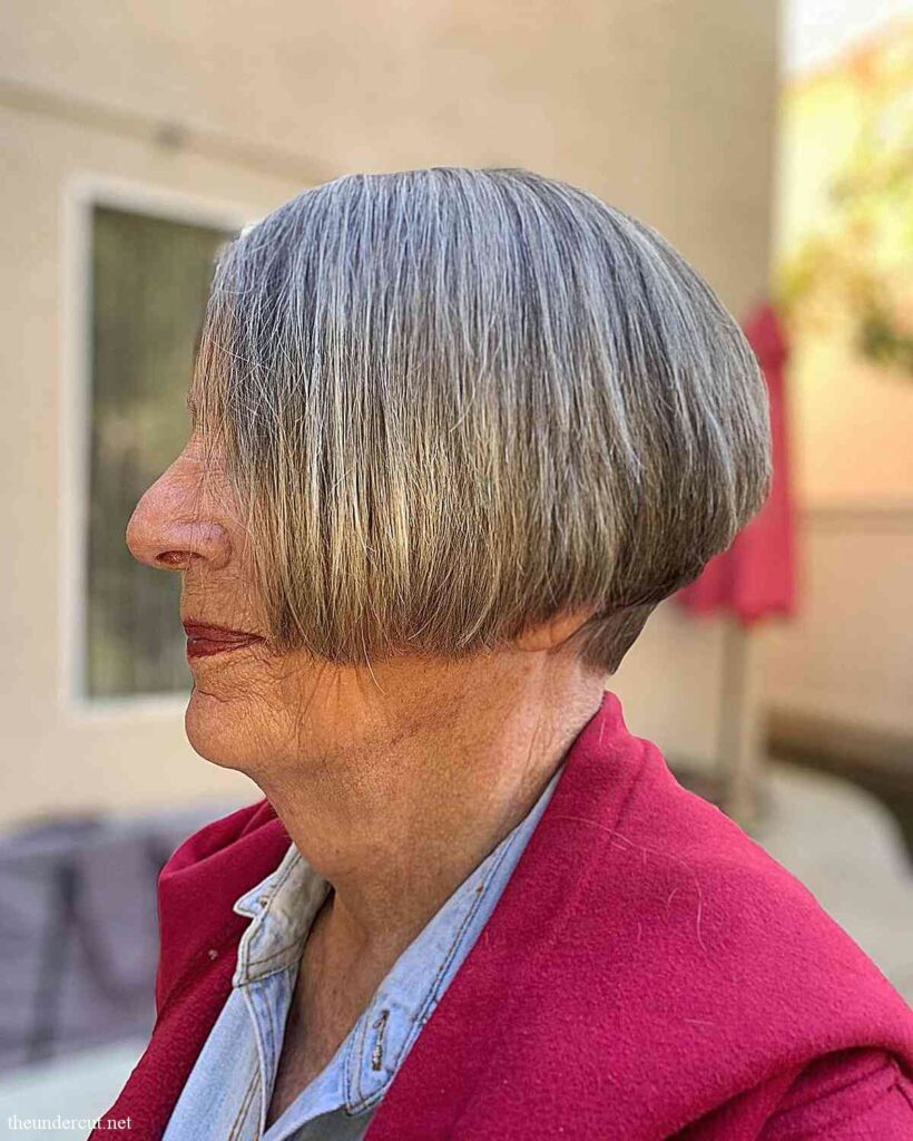 cheek length graduated haircut on older ladies over 60 with thick hair
