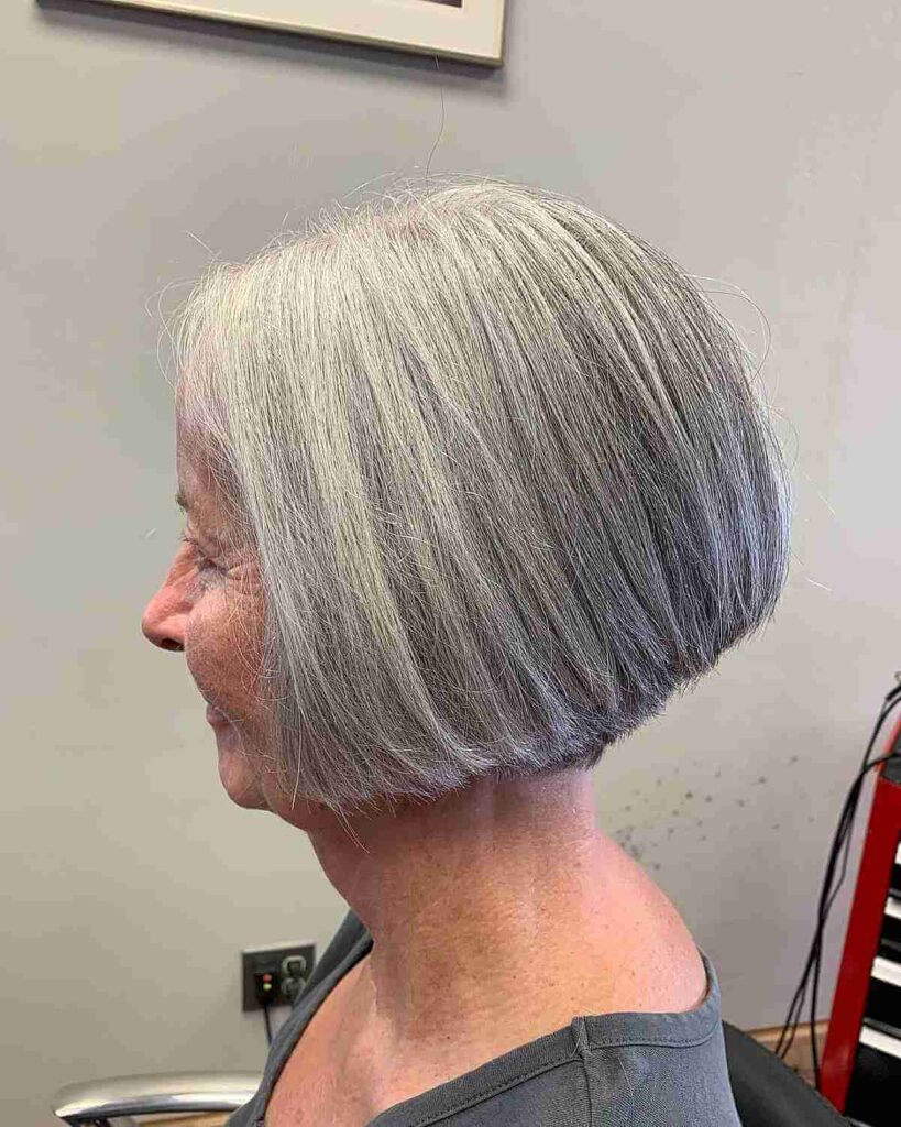 chin length low stacked gray bob for older ladies