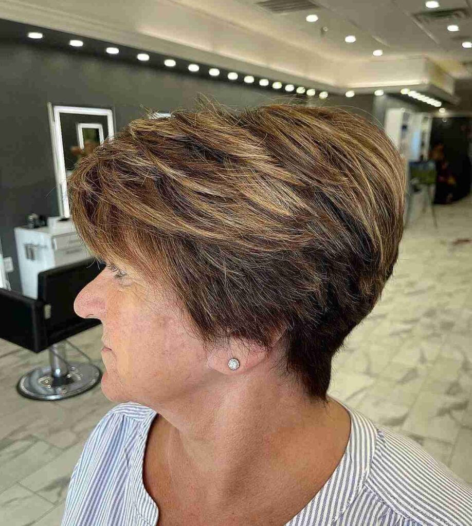 ear length brunette haircut with blonde highlights for older ladies