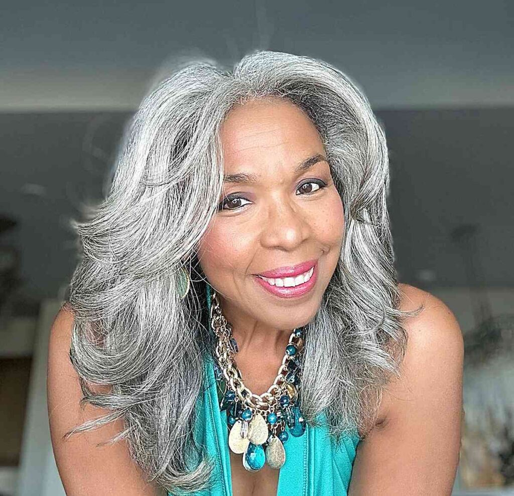 layered silvery white hair with grey tips for mature women