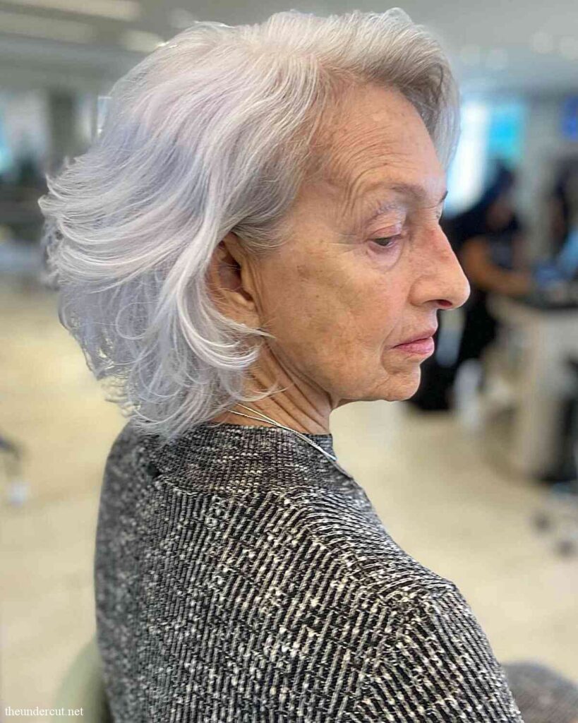 messy wavy bob with feathered layers for seniors over 60 with dense hair