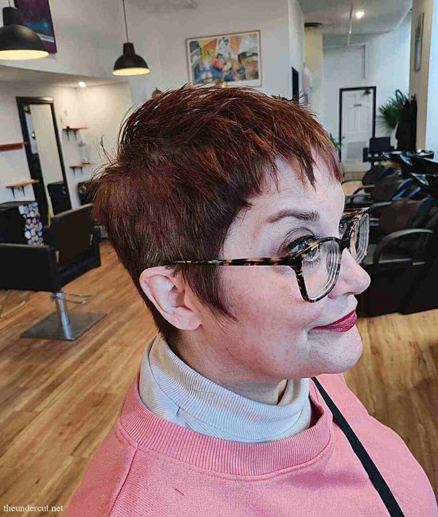 piecey bangs on short crop pixie cut for women aged 50 with glasses