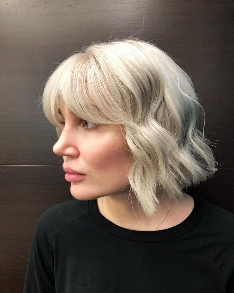 slightly inverted bob with waves and bangs