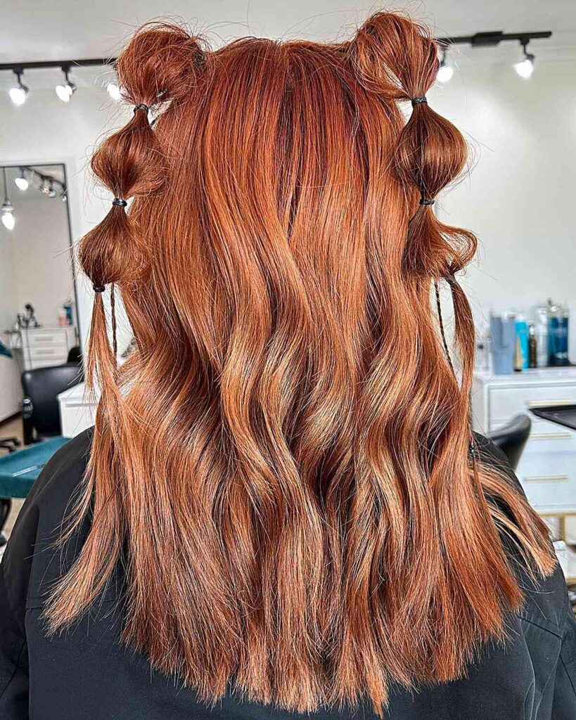 vibrant copper hair with half up bubbler pigtails for festival events
