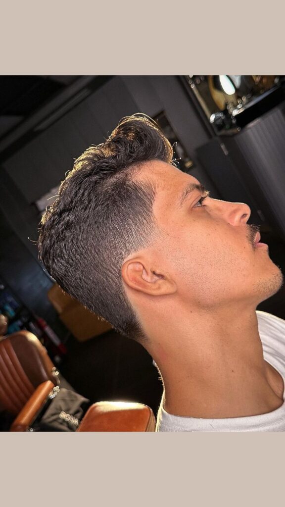 Low Taper Fade with Brushed Up Hair 1