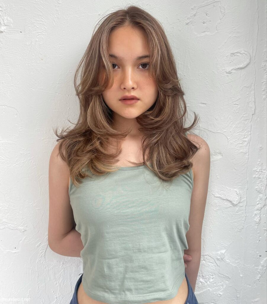 Natural Color 90s Blowout Hairstyle