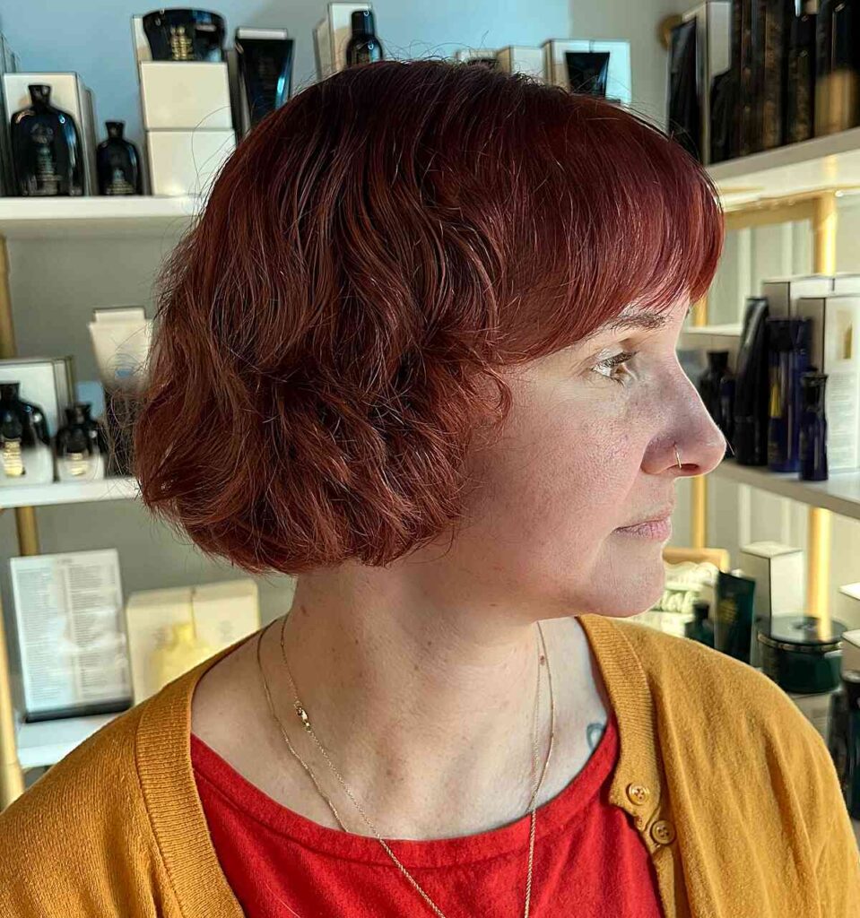 french bob cut for women in their s with plump faces