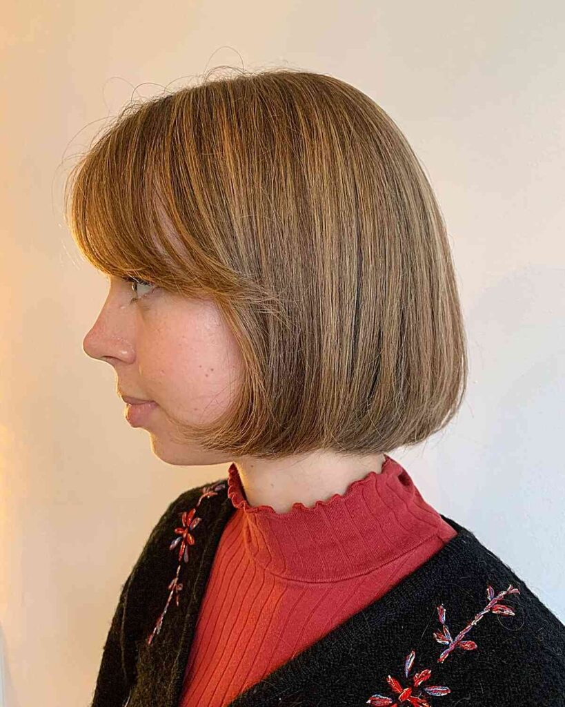 round bob with side swept bangs for round faces