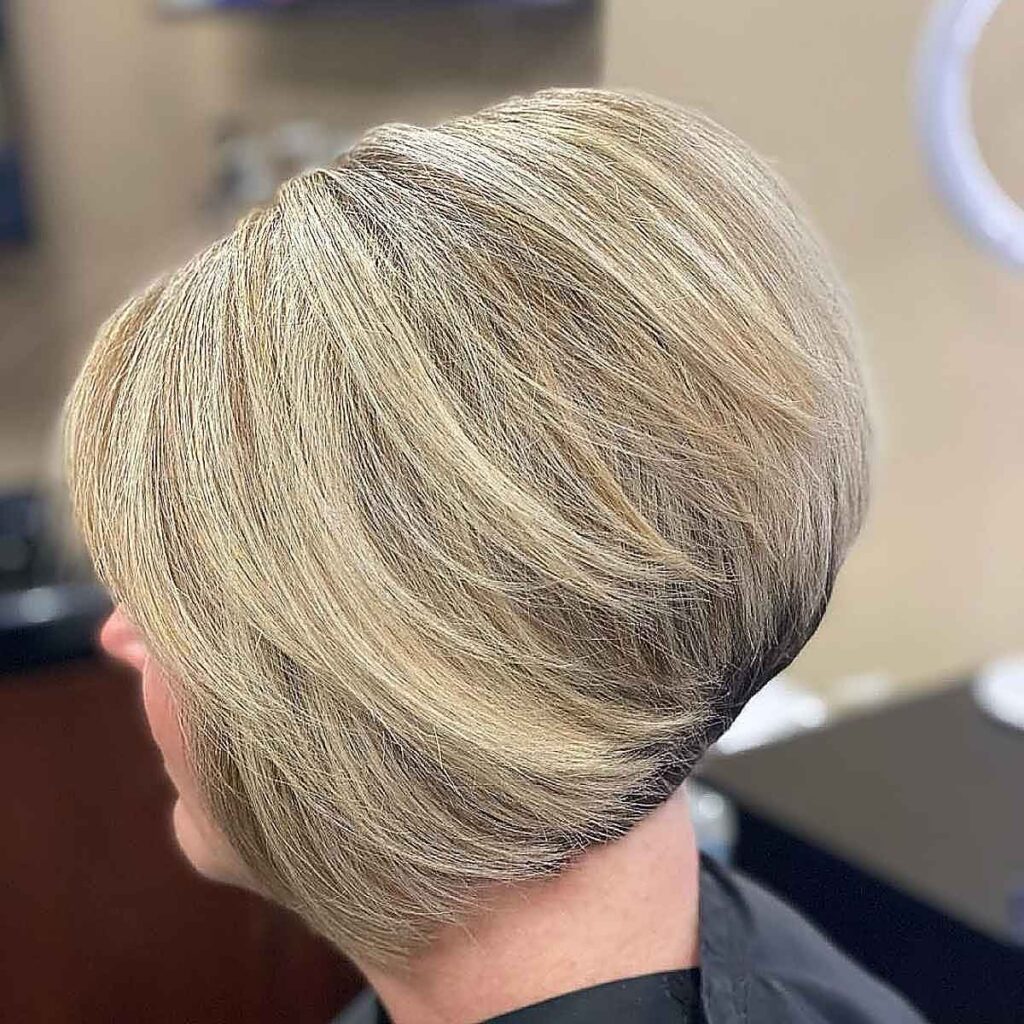 sassy inverted bob for women over forty with double chins